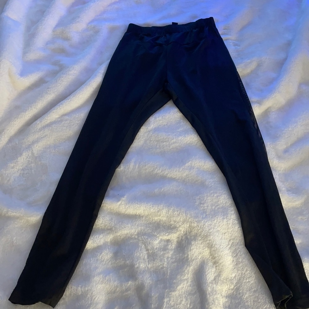 Black leggings with mesh on side of the legs